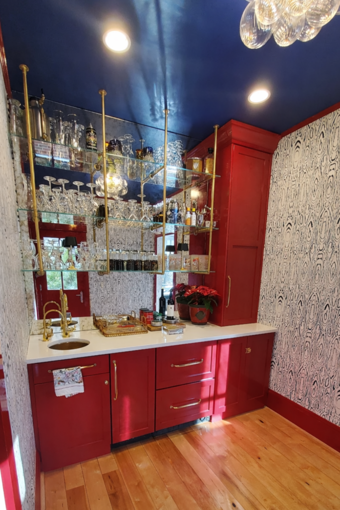 red high-gloss maximalist wet bar